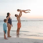 Family Strolling on the Beach